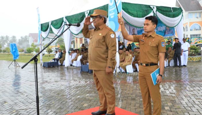 Diguyur Hujan Lebat, Upacara HKN Tetap Khidmat di Aceh Utara